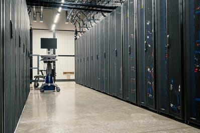 SATA-TECH data center — rows of server racks